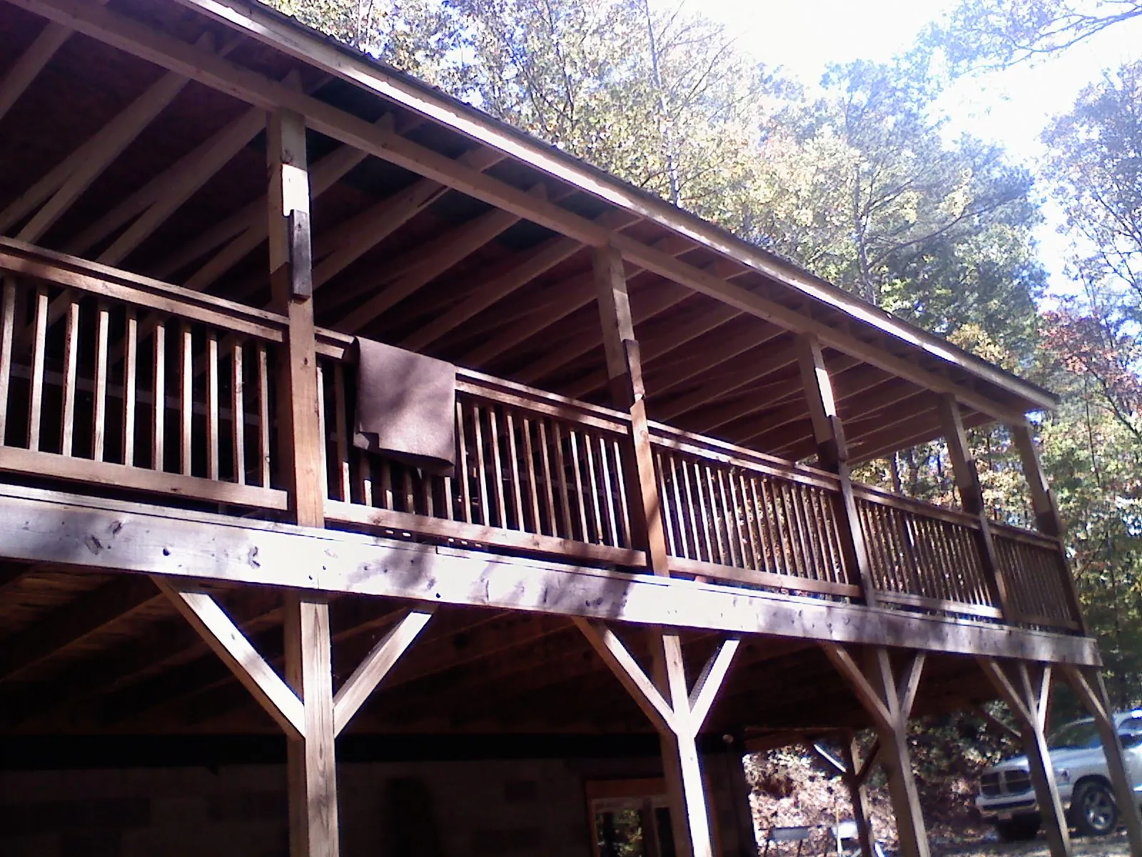 Timber framing under a new elevated porch and deck — Roof Leak Repair in Cardwell by Roofing Brothers